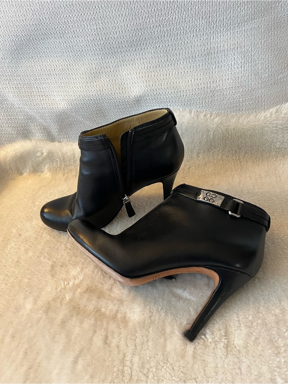 Coach Biancca Elegant Black Leather Ankle Booties with Silver Buckle Accent